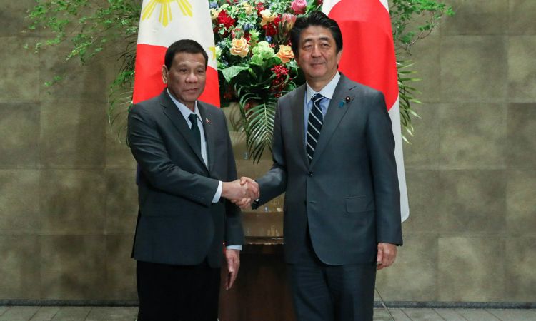 This image has an empty alt attribute; its file name is PRRD-Abe-Japan-handsake_CNNPH.jpg